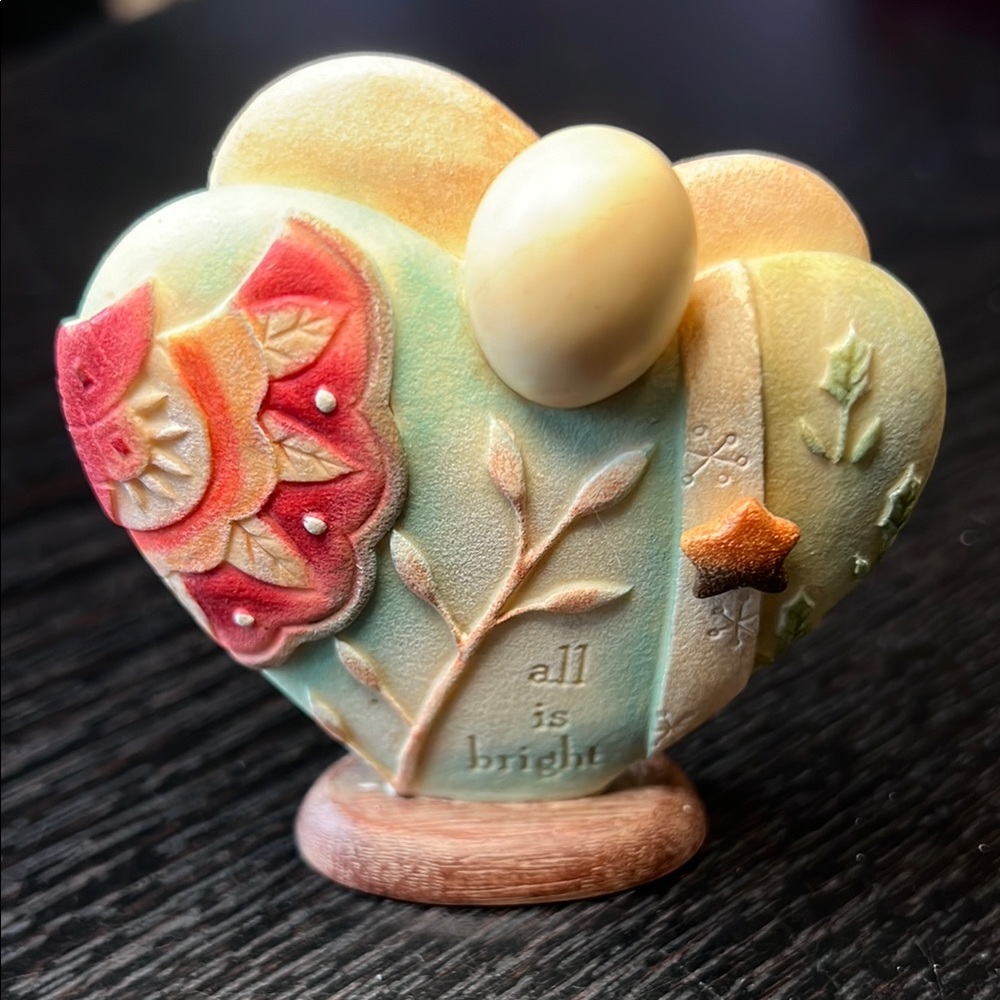 Enesco pastel heart figurine with cream egg and red floral accent 3”X3”